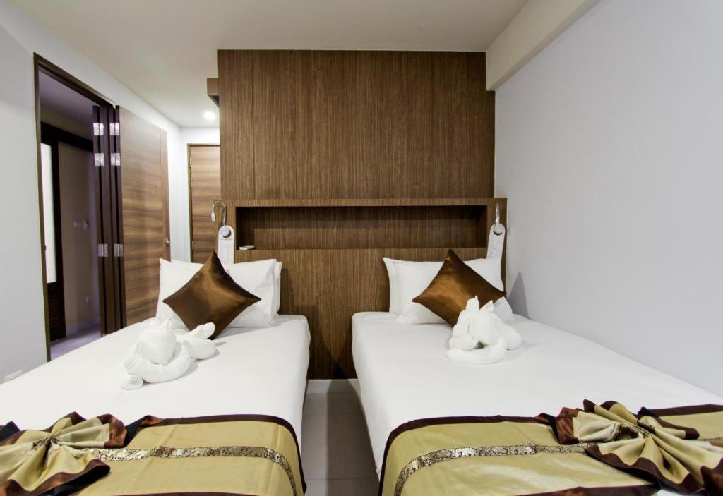 Elegancy Sansabai Hotel Patong Bagian luar foto